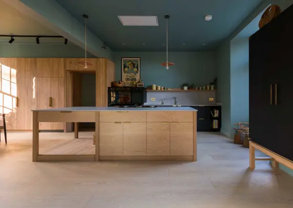 A bespoke contemporary kitchen that balances tradition and modernity, echoing the landscape it inhabits.