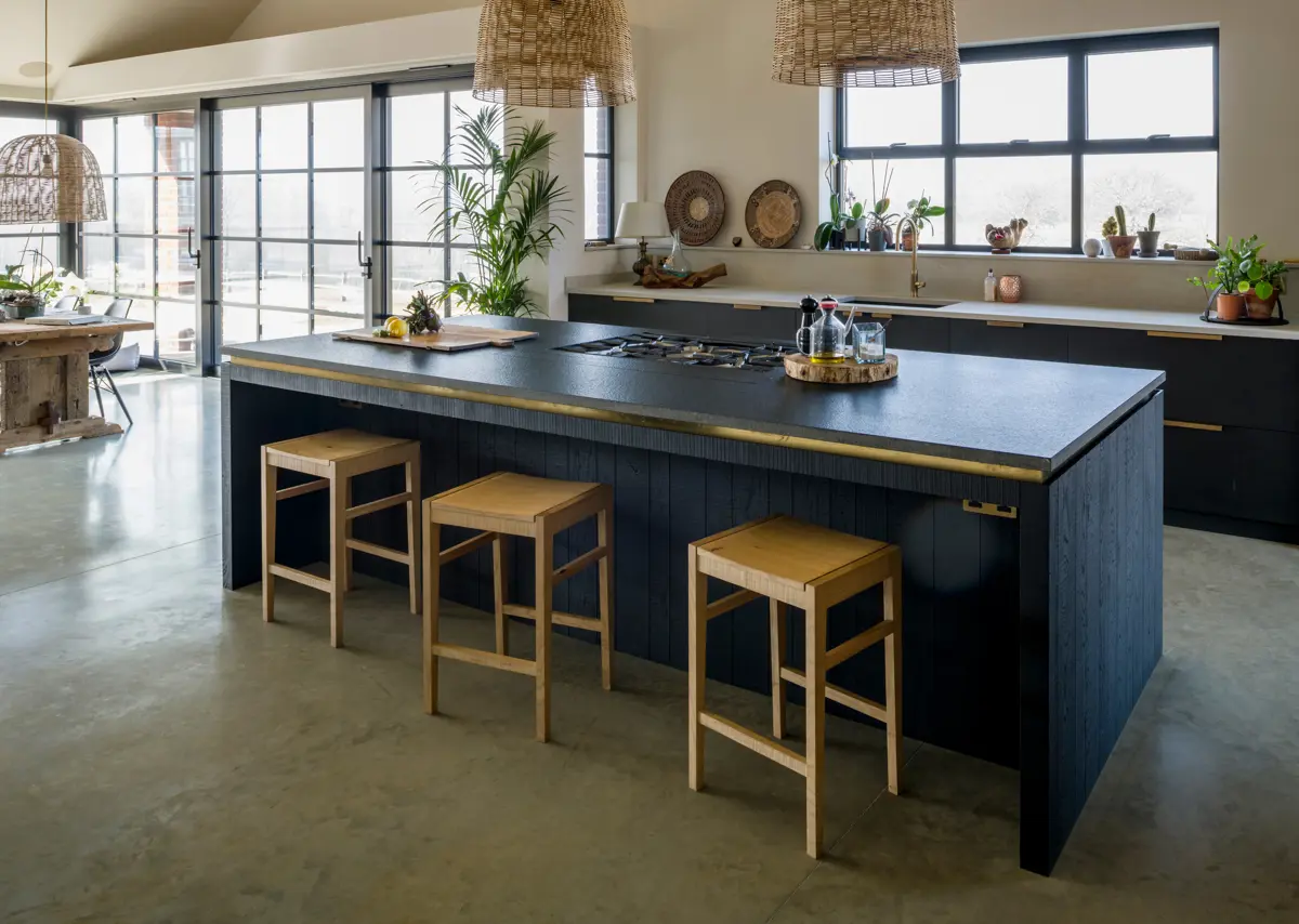 A sociable kitchen space with a central bespoke kitchen island for dinner prep, morning coffee or impromptu gatherings.